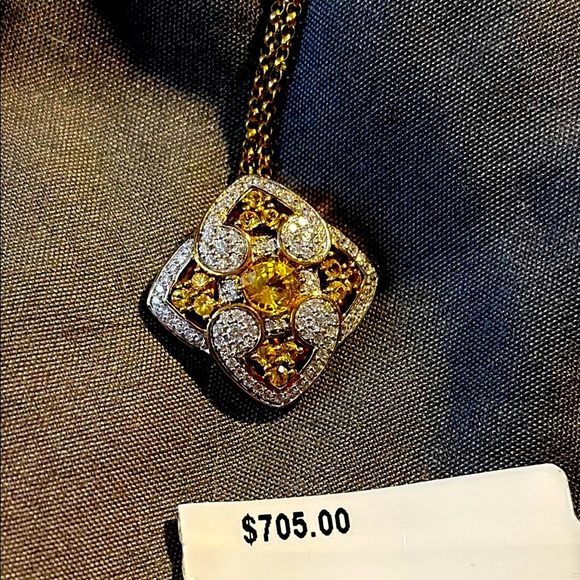 Elegant Gold and Silver Pendant Necklace